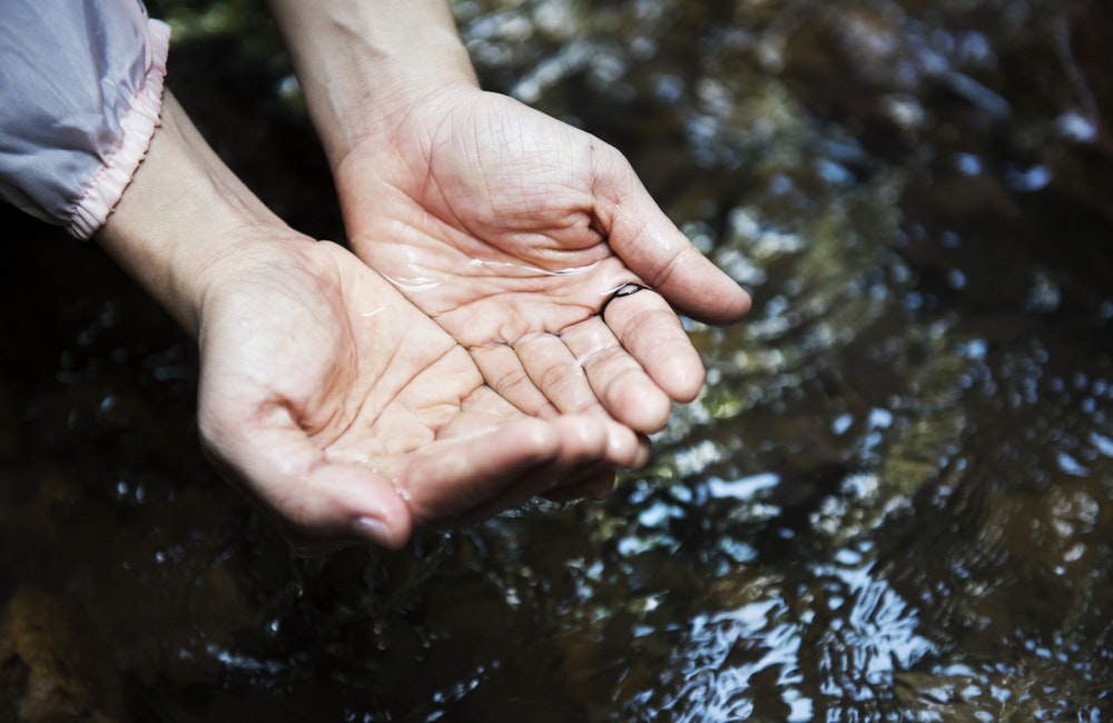 hands on clear water