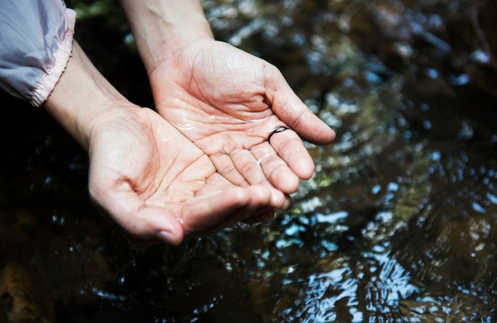 hands on clear water